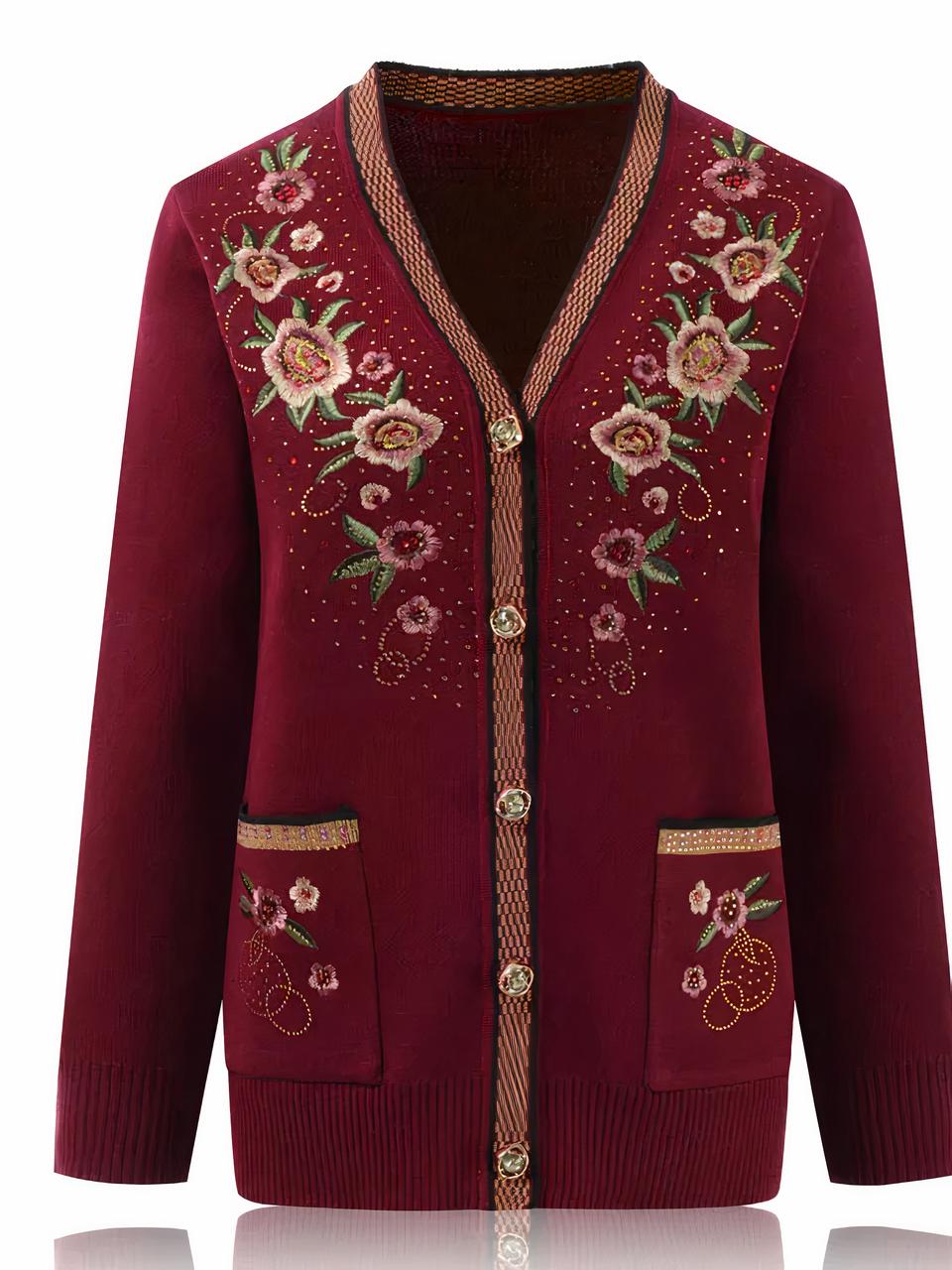 Cardigan bordeaux avec des fleurs brodées sur les épaules et la poitrine ainsi que sur les poches